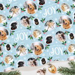 Christmas Joy Snowflake Photo Collage Pastel Blue Wrapping Paper<br><div class="desc">'Wishing you joy' fun and stylish gift wrap! An editable template, personalized with six photos of your family, friends or pets. You can also include the recipient's name, your family name or the holiday year. A seamless pattern with snowball framed photographs, festive leaves, berries, snow, snowflakes and stars. Custom gift...</div>