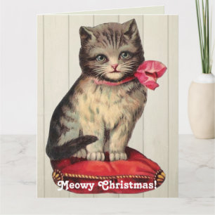 Christmas Kitten Sitting Wearing a Red Bow Card