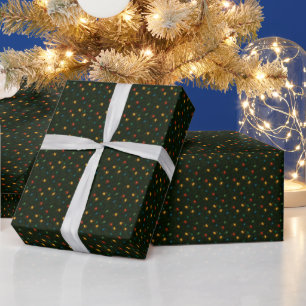 Christmas lights wrapped in holly leaves patterned wrapping paper