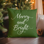 Christmas Merry and Bright Red Green Throw Pillow<br><div class="desc">Reversible minimal design with "Merry and Bright" in modern white script typography against a forest green background on one side and a burgundy red background on the other side.</div>