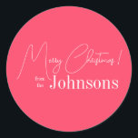 Christmas Modern Pink Family Classic Round Sticker<br><div class="desc">This is a stylish, Merry Christmas design. It is in trending modern pink and white and has the message, "Merry Christmas! from the Johnsons". Ideal for your Christmas gift wrap, mailing accessories. envelope seals, and party favour seals this festive season. To personalize, simply add your name in the personalize this...</div>