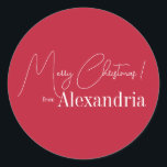 Christmas Modern Red Merry Christmas From Name Classic Round Sticker<br><div class="desc">This is a modern, Merry Christmas design. It is in festive red and white and has the message, "Merry Christmas! from Alexandria". Ideal for your cards, Christmas gift wrap, mailing accessories. envelope seals, and party favour seals this festive season. To personalize, simply add your name in the personalize this text...</div>