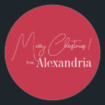 Christmas Modern Red Merry Christmas From Name Classic Round Sticker<br><div class="desc">This is a modern, Merry Christmas design. It is in festive red and white and has the message, "Merry Christmas! from Alexandria". Ideal for your cards, Christmas gift wrap, mailing accessories. envelope seals, and party favour seals this festive season. To personalize, simply add your name in the personalize this text...</div>