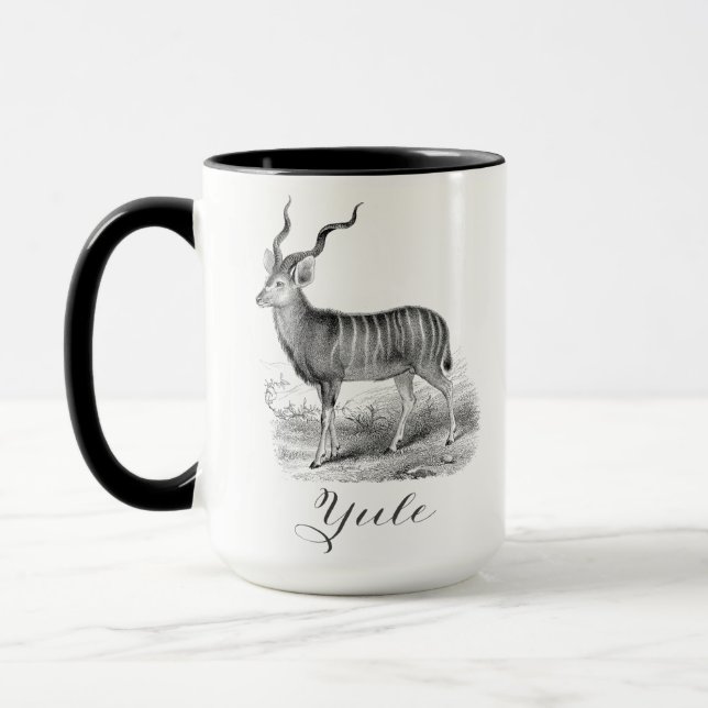 Christmas mug with antique deer etching says Yule. (Left)