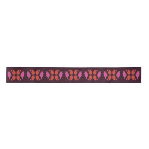 Christmas pattern in red and pink satin ribbon