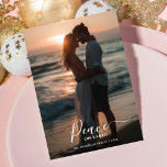 Christmas Peace On Earth Sunset Beach Photo  Holiday Card<br><div class="desc">Send holiday wishes with a "Peace on Earth" beach photo Christmas card. This simple, modern design is perfect for newlyweds and those who love sunset beach themes. Featuring minimalist script, the card captures a rustic and peaceful vibe. Ideal for photo insert Christmas cards and sharing "It's a Wonderful Life" holiday...</div>
