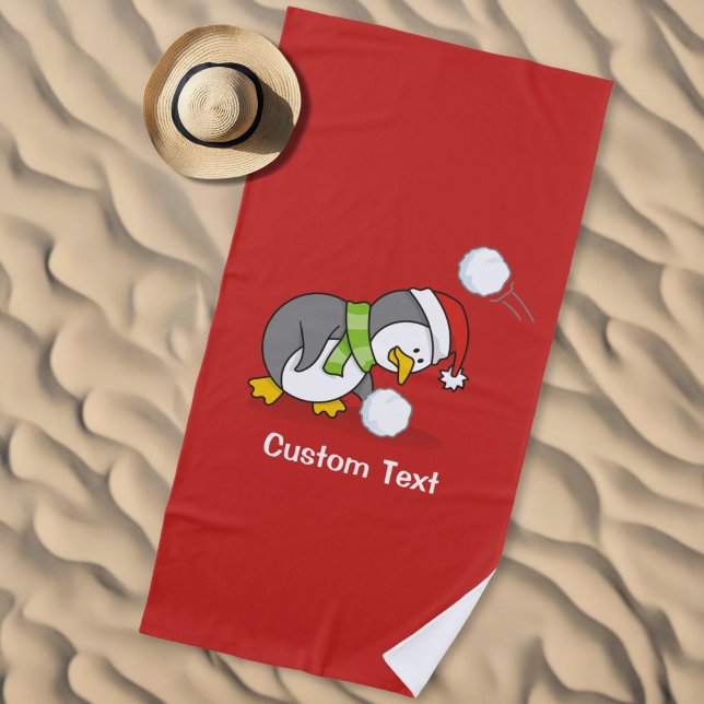 Christmas penguin getting a snow ball beach towel (Creator Uploaded)