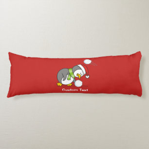Christmas penguin getting a snow ball body pillow