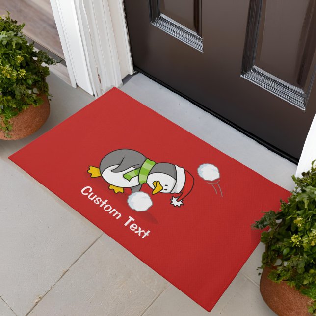 Christmas penguin getting a snow ball doormat (Creator Uploaded)