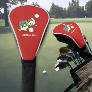 Christmas penguin getting a snow ball golf head cover