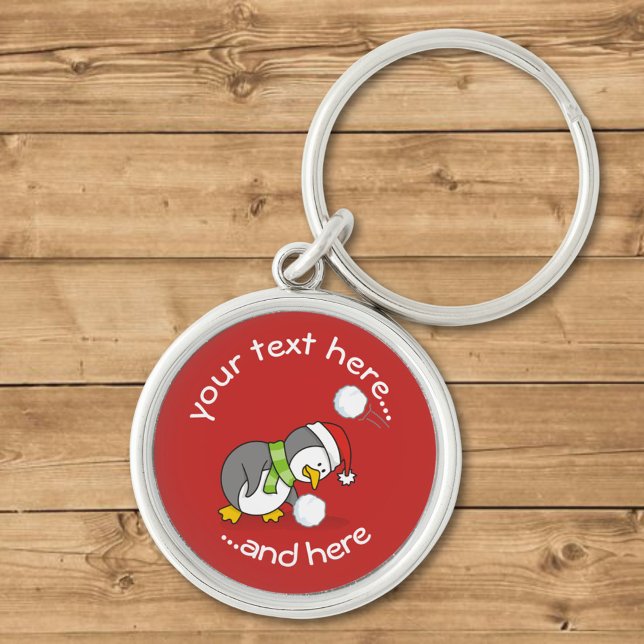 Christmas penguin getting a snow ball keychain (Creator Uploaded)