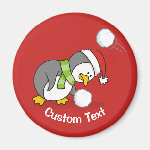 Christmas penguin getting a snow ball magnet