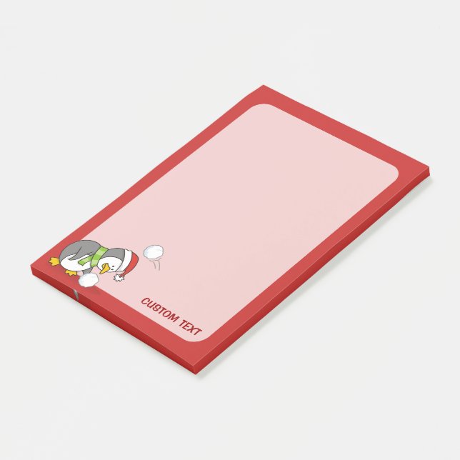 Christmas penguin getting a snow ball post-it notes (Angled)