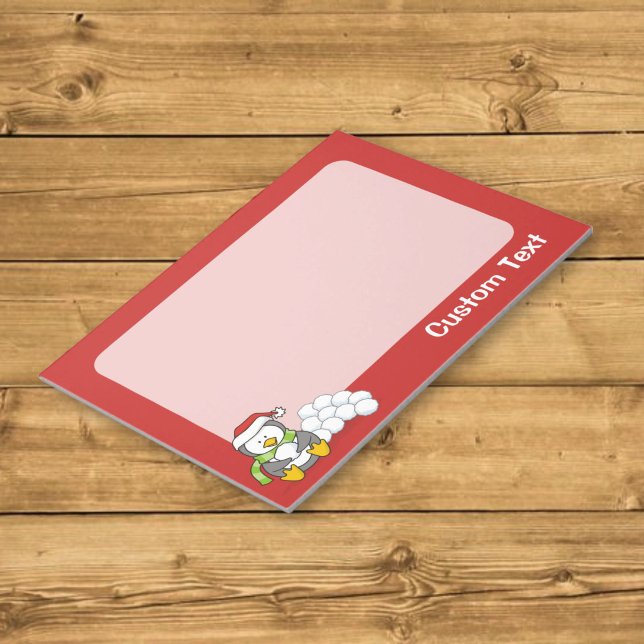 Christmas penguin sitting with snow balls notepad (Creator Uploaded)