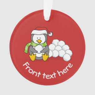 Christmas penguin sitting with snow balls ornament