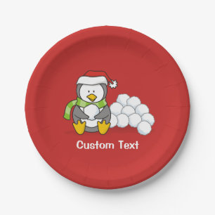 Christmas penguin sitting with snow balls paper plate