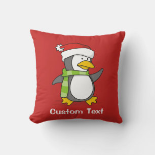 Christmas penguin walking on snow throw pillow