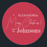 Christmas Personalized Red Family Classic Round Sticker<br><div class="desc">This is a personalized, modern, Merry Christmas design. It is in festive red and white and has the message, "To Alexandra" "Merry Christmas! from the Johnsons". Ideal for your Christmas gift wrap and party favour seals this festive season. To personalize, simply add the to name and your name in the...</div>