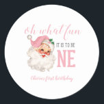 Christmas Pink Santa First Birthday Classic Round Sticker<br><div class="desc">Oh what fun,  it is to be One! Christmas Pink Santa first birthday party stickers with watercolor pink santa.</div>