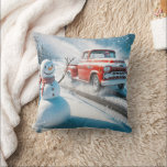 Christmas Red Retro Truck With Snowman Throw Pillow<br><div class="desc">A cheerful snowman stands beside a road as a vintage red truck drives by in a snowy landscape</div>