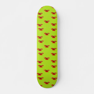 Christmas red ribbon on bright green skateboard