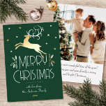 Christmas Reindeer Custom Photo Forest Green Gold Foil Holiday Card<br><div class="desc">Elegant gold foil Christmas cards with an Art Deco style and your own personalized photo on the back. This editable template features a leaping reindeer with festive leaves, berries and stars. A stylish colour palette of bluedark forest green, white and real foil elements in gold, silver or rose gold. The...</div>