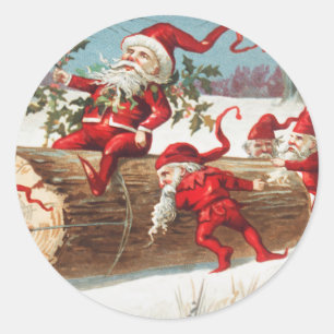 Christmas Santa elves sliding on a log Holiday Classic Round Sticker