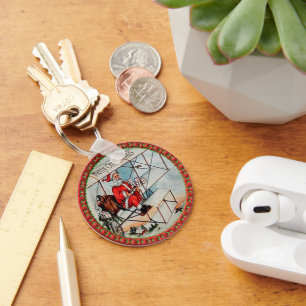 Christmas Santa flying a old airplane Keychain
