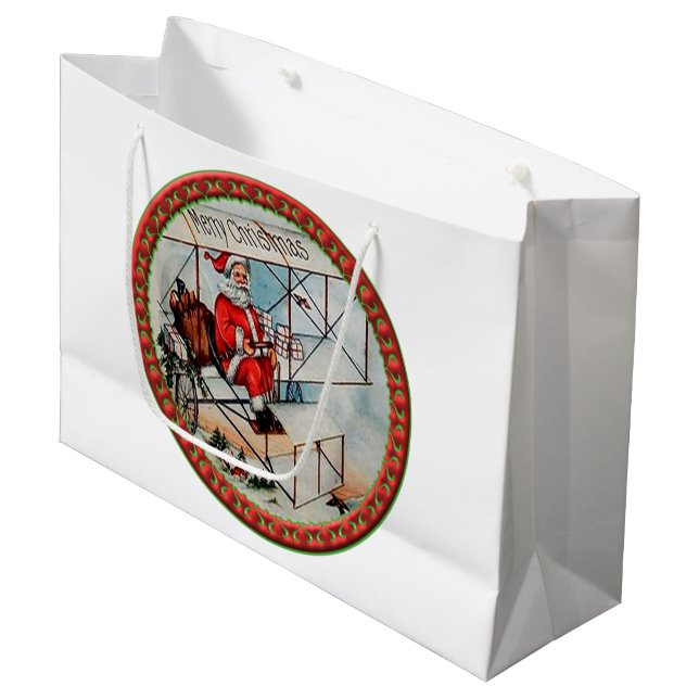Christmas Santa flying a old airplane Large Gift Bag (Front Angled)