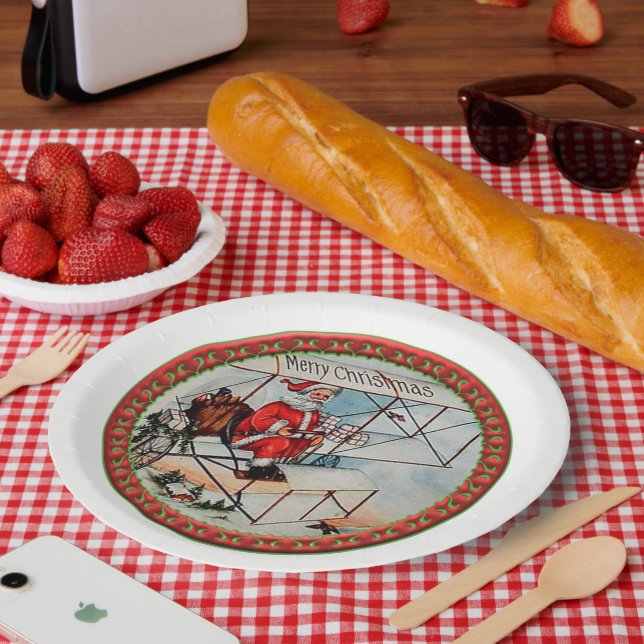 Christmas Santa flying a old airplane Paper Plate (Picnic)