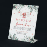 Christmas Santa My Water Broke Baby Shower Game Pedestal Sign<br><div class="desc">The Red Santa Gender Neutral Santa Baby Clothes Christmas My Water Broke Baby Shower Game adds a playful, holiday twist to your baby shower! With a vibrant red design featuring cute Santa-themed baby clothes, snowflakes, and touches of eucalyptus greenery, this game invites guests to participate in the classic "My Water...</div>