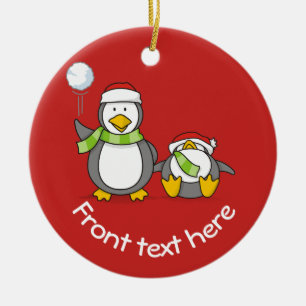 Christmas Snowballing penguins Ceramic Ornament