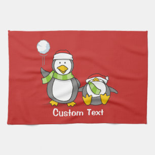 Christmas Snowballing penguins Kitchen Towel