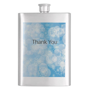 Christmas snowflakes on a blue background       hip flask