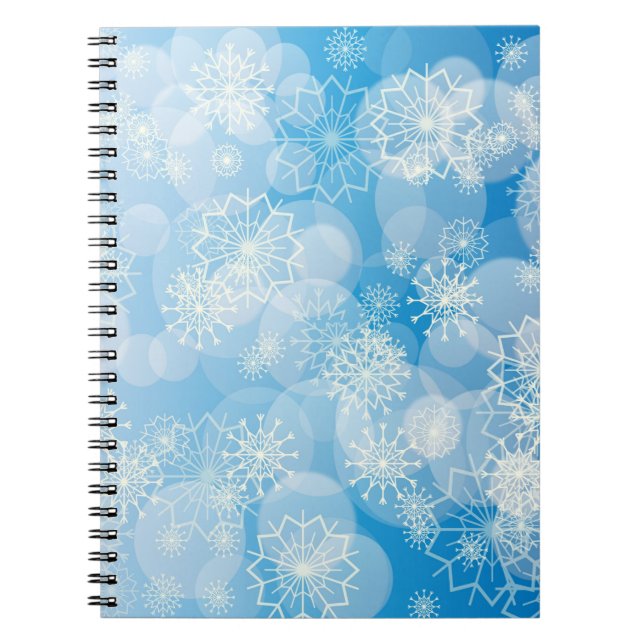 Christmas snowflakes on a blue background        notebook (Front)