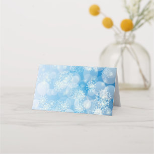 Christmas snowflakes on a blue background place card