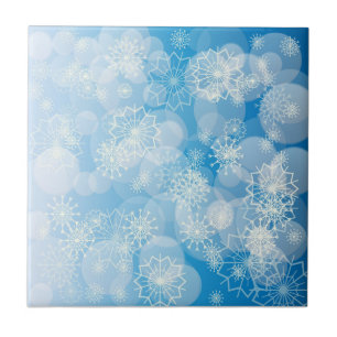 Christmas snowflakes on a blue background tile