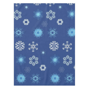 Christmas snowflakes on blue tablecloth