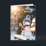 Christmas Snowman On a Park Bench Holiday Card<br><div class="desc">Cute Christmas snowman on a park bench in a winter forest with sunbeams</div>