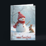 Christmas Snowman With Bunny Holiday Card<br><div class="desc">A snowman wearing a red hat and scarf stands cheerfully beside a small bunny,  also dressed warmly,  surrounded by a snowy landscape with gentle snowfall.
Text can be changed.</div>