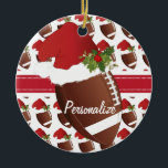 Christmas Sport Football Santa Hat Ceramic Ornament<br><div class="desc">Football Christmas Ornament. 100% Customize-able. Ready to Fill in the box(es) or Click on the CUSTOMIZE IT button to change, move, delete or add any of the text or graphics. Made with high resolution vector and/or digital graphics for a professional print. NOTE: (THIS IS A PRINT. All zazzle product designs...</div>