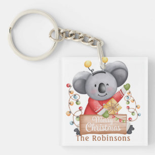 Christmas Teddy Bear with Gift and Snowflakes Keychain