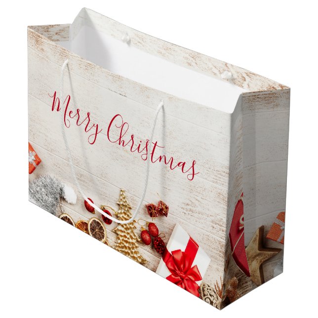 Christmas Themed Items on a Rustic Wooden Board Large Gift Bag (Front Angled)