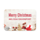 Christmas Themed Items on a Rustic Wooden Board