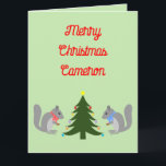 Christmas Tree Decorating Squirrels Custom Card<br><div class="desc">This awesome Christmas card features a digital art image of a pair of cute squirrels decorating a Christmas tree with brightly coloured hazelnuts. The tree is green with a yellow star on top and each squirrel is holding a Hazelnut to eat and wearing a scarf to keep warm in the...</div>