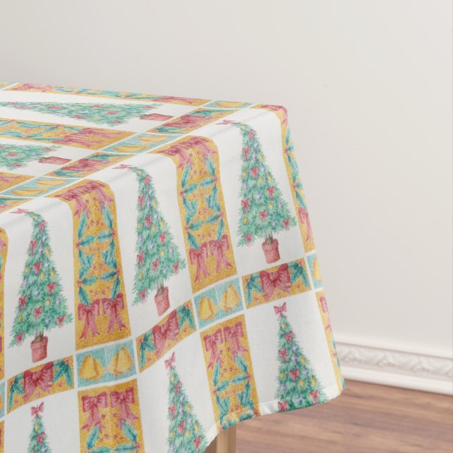 Christmas tree decoration with red bows gold bells tablecloth (In Situ)