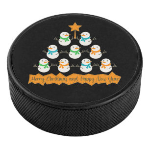 Christmas tree pyramid made of xmas snowmen hockey puck