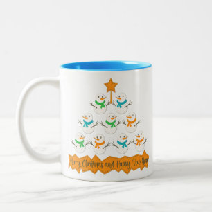 Christmas tree pyramid made of xmas snowmen Two-Tone coffee mug