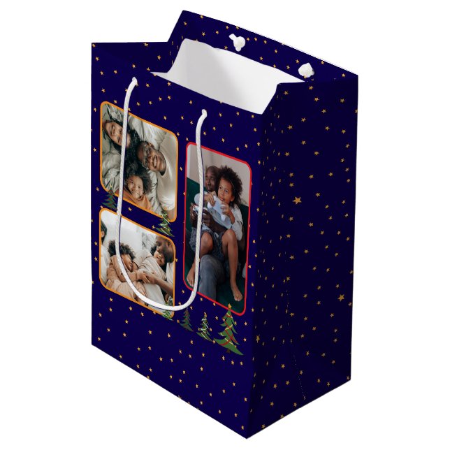 Christmas trees on starry blue photo collage medium gift bag (Front Angled)