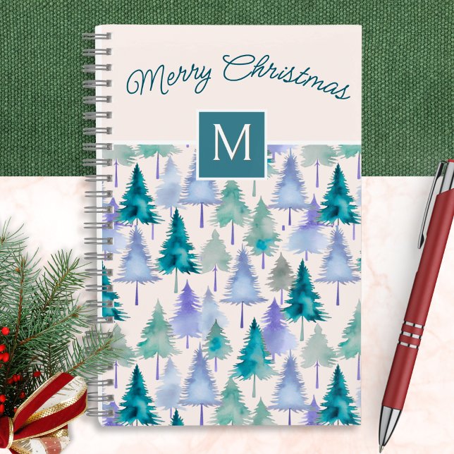 Christmas Trees Pattern Blush Pink Monogrammed Notebook (A festive monogrammed notebook with pattern of green and blue Christmas trees in a watercolor style)